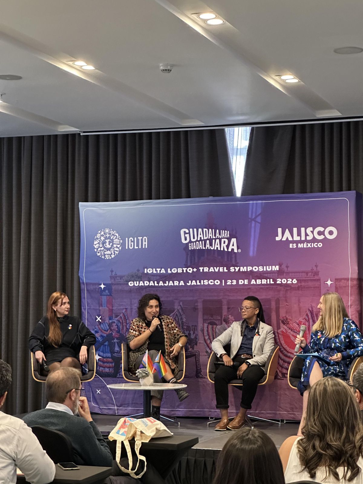 Santi speaking on a panel at the IGLTA LGBTQ+ Travel Symposium in Guadalajara
